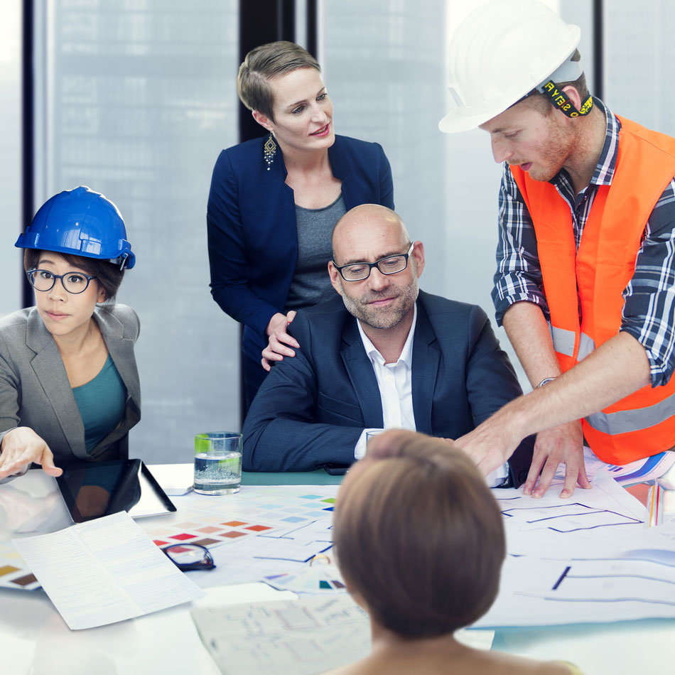 Picture of a group of people in a meeting and talking