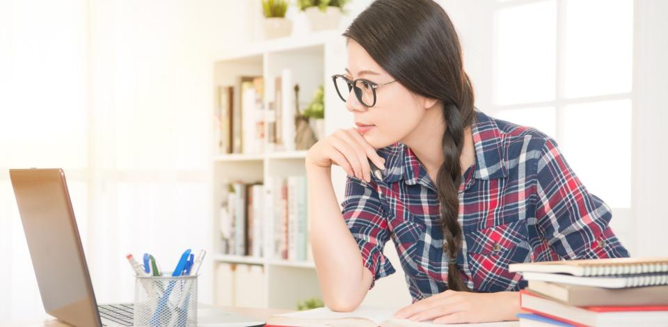 Female college student learning remotely