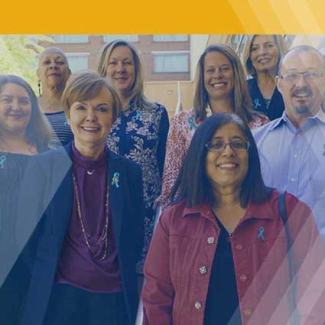 GTPE employees standing in front of the Global Learning Center