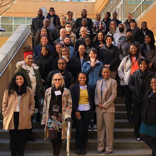 The third cohort of ASPIRE poses on the steps of the Global Learning Center