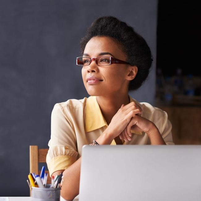 Cropped shot of a young businesswoman working on her laptop in the office