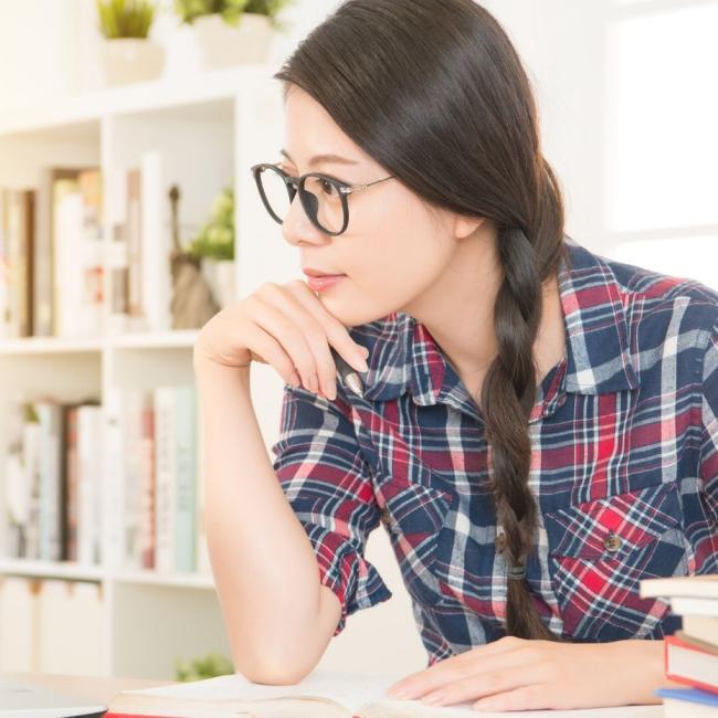 Female college student learning remotely